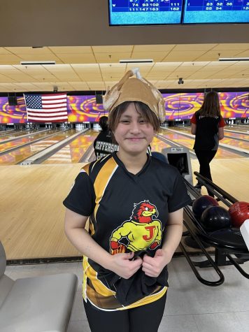 Senior Sofia Lofranco poses in a turkey hat to celebrate her performance against Freeport.